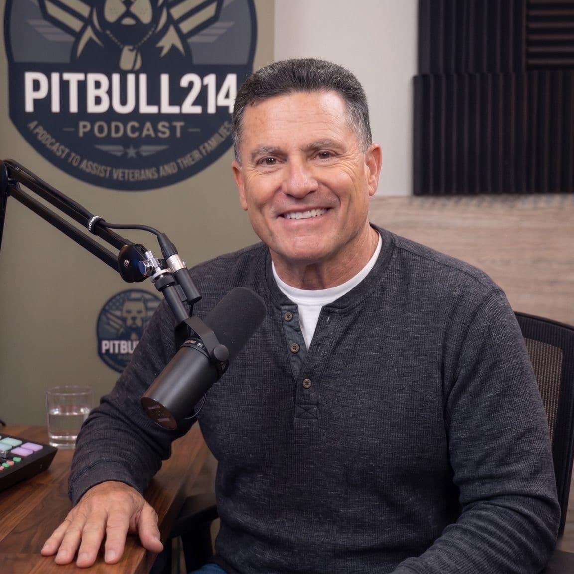 Rick Perales at the Pitbull 214 Podcast studio microphone